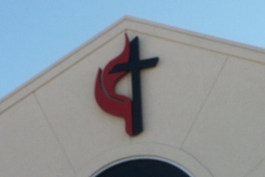 United Methodist cross and flame